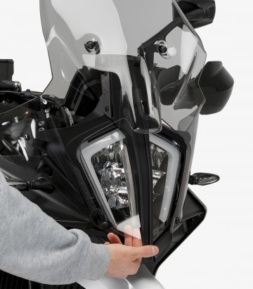 Protector de Faro Adhere Puig 21613W para KTM 790 / 890 Adventure, 890 SMT (23-26)